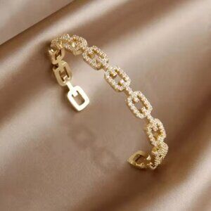 Cubic zirconia link design cuff bracelet